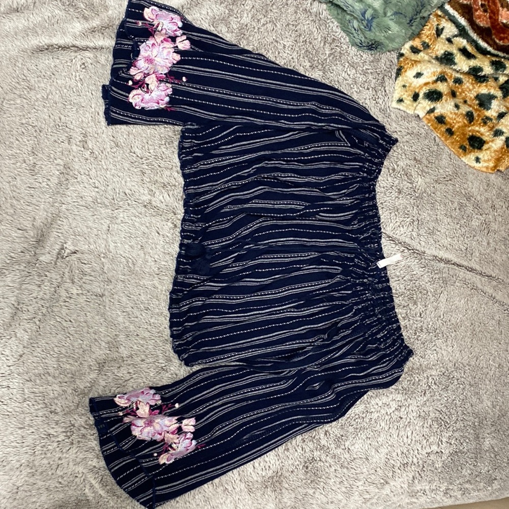 Woman’s off the shoulder crop top